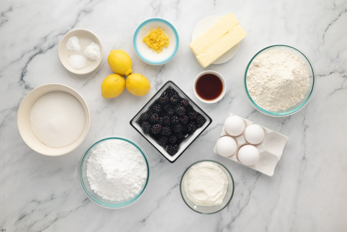 Ingredients needed to make lemon blackberry Bundt cake with fresh blackberry glaze