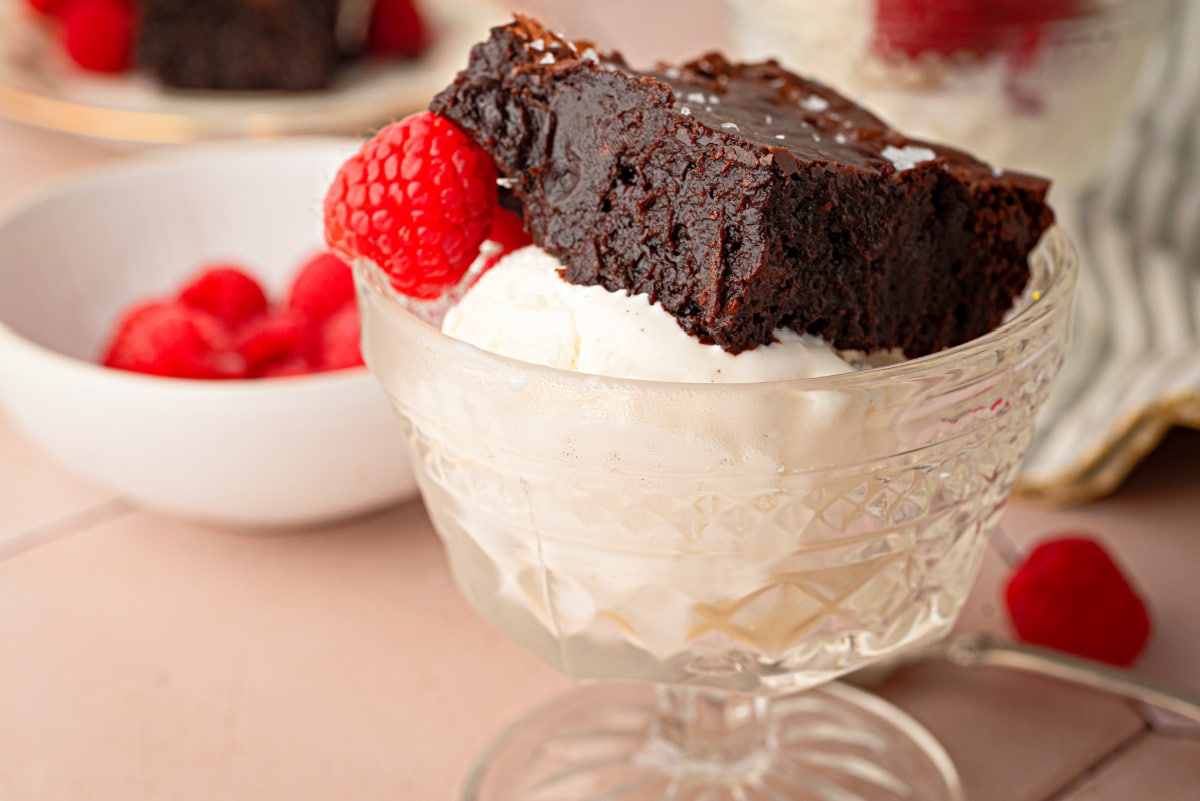 Cabernet Sauvignon brown butter brownie served over vanilla ice cream with fresh raspberries.