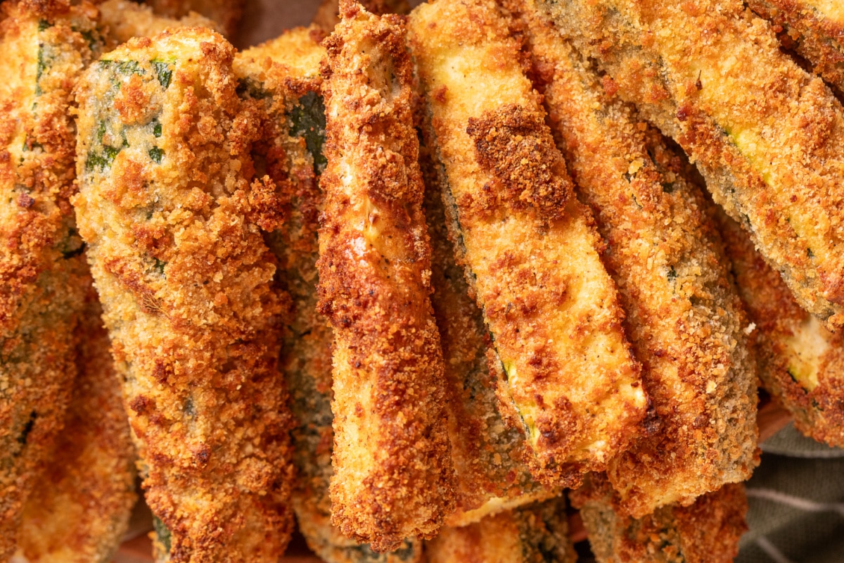 Close-up of crispy Air Fryer Zucchini Fries showing the golden breadcrumb coating.