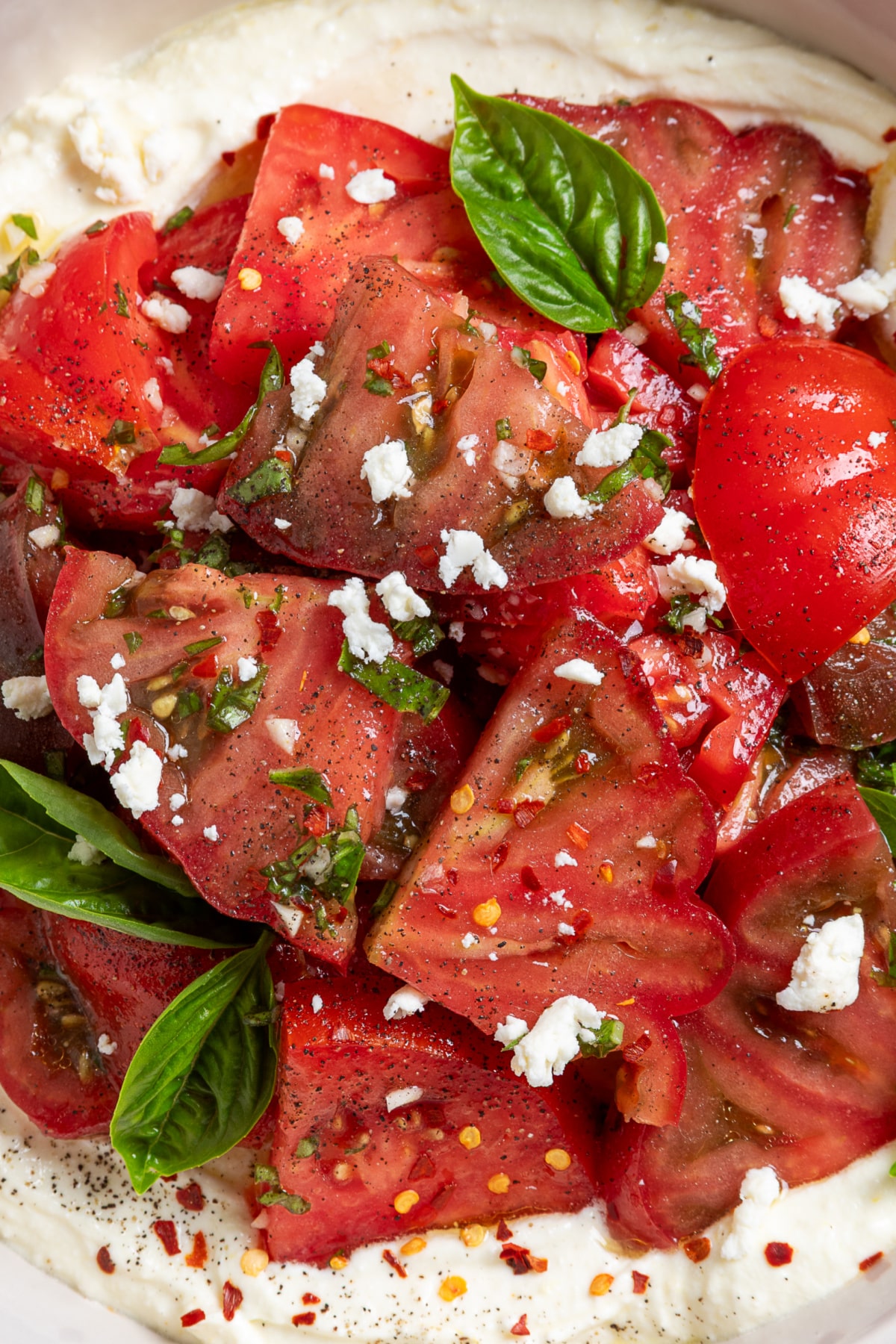 heirloom-tomato-salad-over-whipped-ricotta-feta-close-up