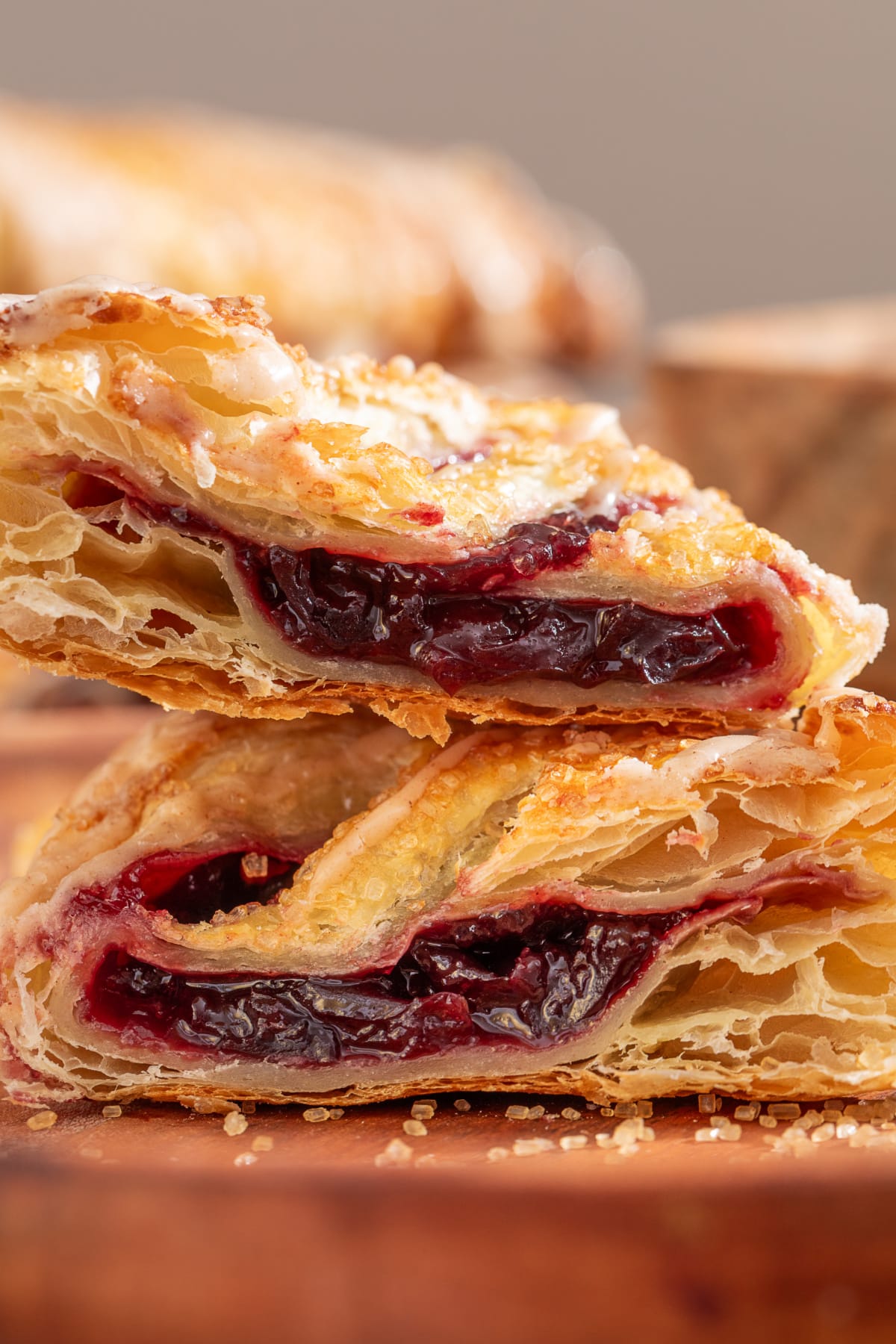 Cherry turnovers with dark cherry filling and cinnamon bourbon glaze