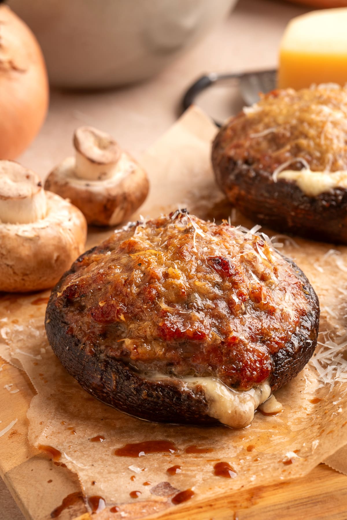 Grilled sausage stuffed portobello mushrooms with mozzarella and Parmesan cheese