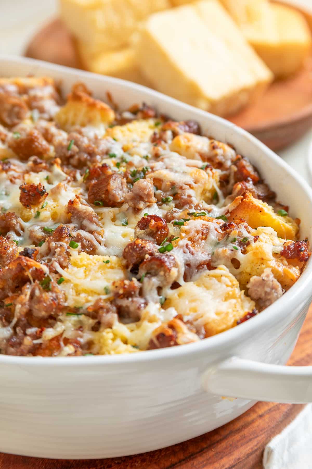 Leftover cornbread breakfast casserole with maple sausage, eggs and melted cheese