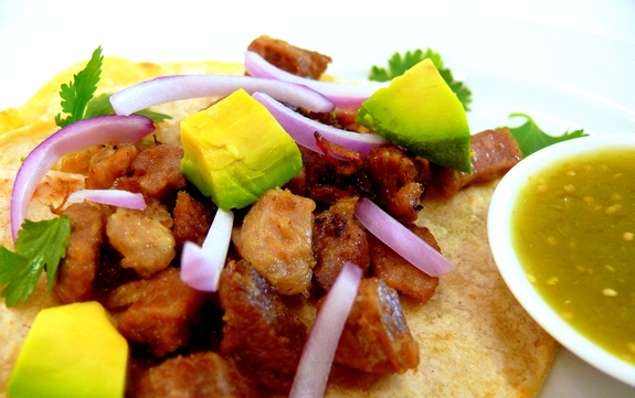 The Best Pork Carnitas are so easy to make they are perfect for a weeknight dinner. Make them for Cinco de Mayo for a delicious, authentic meal. #noblepig #carnitas #tacos #mexican #pork